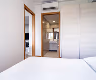 Superior bedroom in Derbyshire Road Apartments, Novena