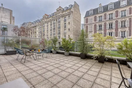 WITH A SPANNING PRIVATE TERRACE, A SUBLIME LUXURY NEAR EIFFEL TOWER