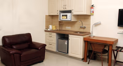 Fully equipped kitchen at City Centre Serviced Apartments- Noida