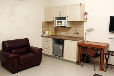 Fully equipped kitchen at City Centre Serviced Apartments- Noida