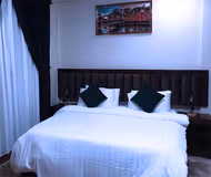 Bedroom at Al Rehab Serviced Apartment