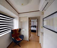 Spacious living area at Shibuyaku Serviced Apartment