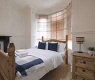 Spacious 4 Bedroom House- Walking Distance to City Centre & Great Backyard