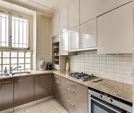 Fully equipped kitchen at 1BR | LOUVRE PLACE VENDOME