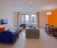 Comfy living area at Al Sayorah Street Serviced Apartments