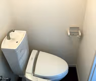 Simplistic living area in Shin Yokohama Apartments