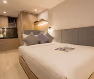 Open plan bedroom at Chatham Circuit Serviced Apartments, Kowloon