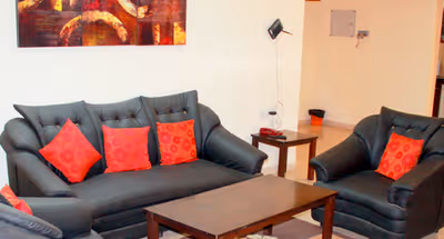 Cosy living area in Emerald City Apartments