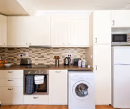 Fully equipped kitchen at Charlotte Quay II