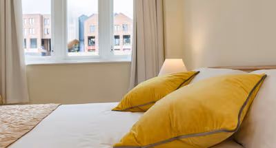 Luxury bedroom at Central Durham Riverfront Apartment