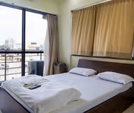 Comfy living area at Ashoka Nagar Apartments