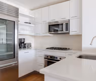 Basic kitchenette at West 42nd Street Furnished Apartment, Manhattan