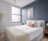 Luxury bedroom at S Wells St #1306 Serviced Apartment, The Loop