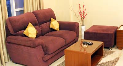 Simplistic living area in Kharadi Apartments