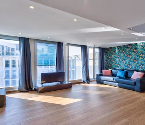 ON THE ICONIC AVENUE DE CHAMPS ELYSEES, HOME TO THE WORLD OF FASHION