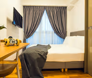 Single bed bedroom at Aljunied Road Serviced Apartments, Sims Avenue