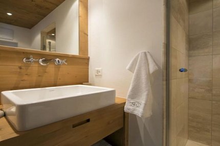 NESTLED JUST OFF THE SKI LIFT WITH ELEVATED VIEWS OF THE VALLEY OF VERBIER