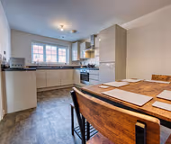 Fully equipped kitchen at Modern 4 Bedroom Apartment
