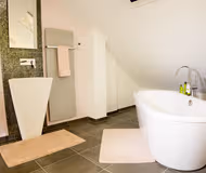 Fully furnished bathroom at Rue Philippe Serviced Apartment
