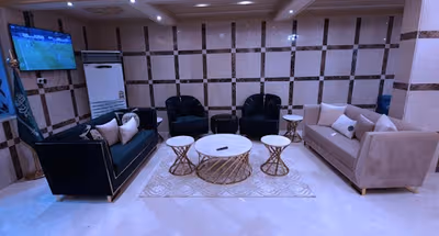 Living area at Al Khateeb Al Tabrizi Street Serviced Apartment
