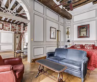 Comfy living room at CUSTOM-BUILT AND EXQUISITELY DESIGNED ODEON SUITE SAINT GERMAIN