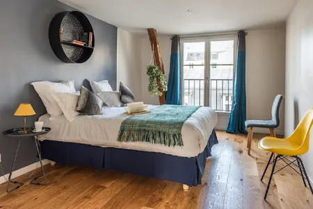 SURROUNDED BY THE BEST OF PARISIAN CULTURE-TUCKED BEHIND CHAMPS ELYSEES