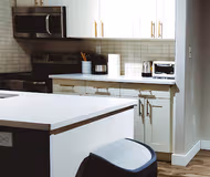 Fully equipped kitchen at </div>Cozy and well furnished loft apartment in Eau Claire