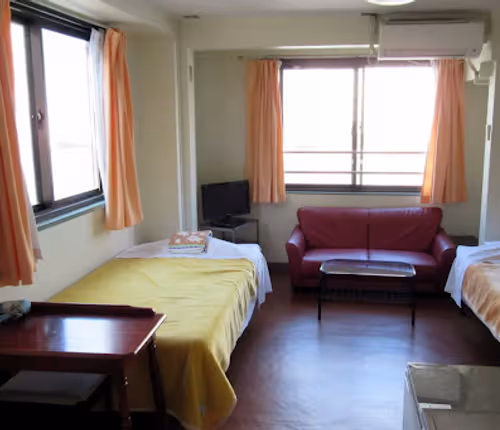 Simplistic living area in Koto-Ku Serviced Apartment