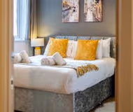 King sized bedroom at Cutlass Court Apartment Birmingham