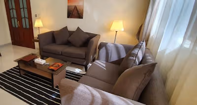 Bright living area at Al Meedar Street Serviced Apartments, Al Zahiyah