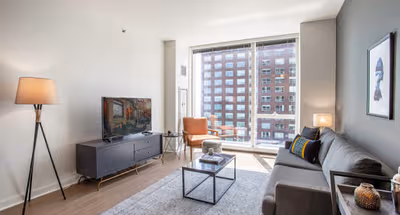 Bright living area at North Lake Shore Drive #2208 Serviced Apartment, Streeterville