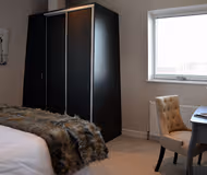 Superior bedroom in Geneva Apartments
