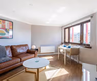 Bright living area at Stunning 1 Bed Merchant City Apartment with Parking