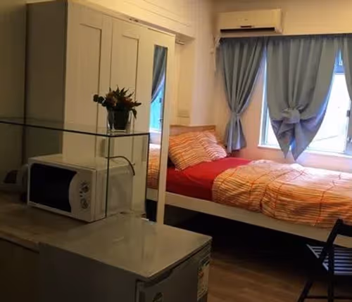 Comfy living area at Tai Ping Shan Serviced Apartments