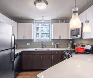 Fully equipped kitchen at N. Jefferson #1701 Serviced Apartment, West Loop