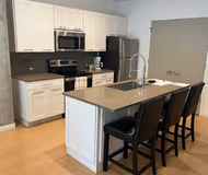 Fully equipped kitchen at Encore Apartment