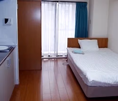 Simplistic living area in 27-Roppongi Apartments