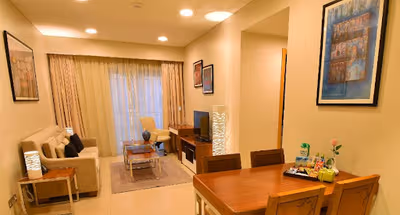 Living room at Al Ghubra Street Serviced Apartment