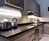 Fully equipped kitchen at Sutherland Street Apartments