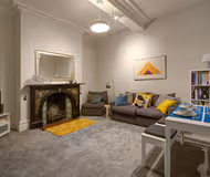 Spacious living room at Old Stocking Factory