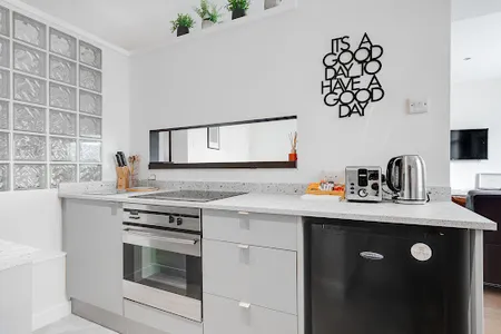 Kitchen at Short Term Rentals apartment