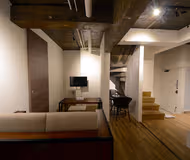 Simplistic living area in Aizumicho Serviced Apartment