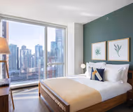 Luxury bedroom at North Lake Shore Drive Serviced Apartment, Streeterville