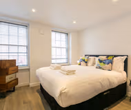 Luxury bedroom at Rathbone Pl