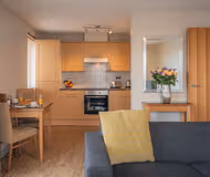 Open plan living dining area inside apartment at Upper Dean Street Birmingham