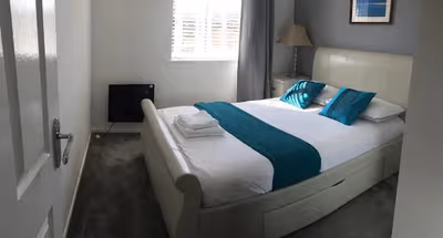 Double bed bedroom at Gatwick Apartments
