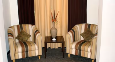 Simplistic living area in Electronic City Serviced Apartments in Bengaluru