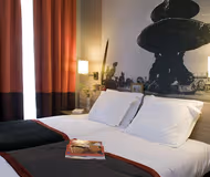 King sized bedroom at Opera Garnier Serviced Apartment