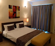 Simplistic living area in Gurgaon Belaire Apartments in DLF Phase 5