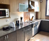 Simplistic living area in Cyber City Serviced Apartments